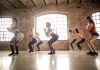 group of women doing exercise inside the building